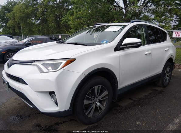 JTMRFREV2JD234133 2018 TOYOTA RAV4 Белый Передняя левая четверть