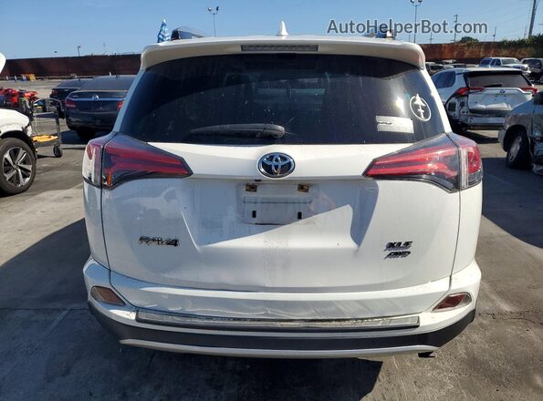 JTMRFREV2JJ198459 2018 TOYOTA RAV4 White Հետևի տեսք