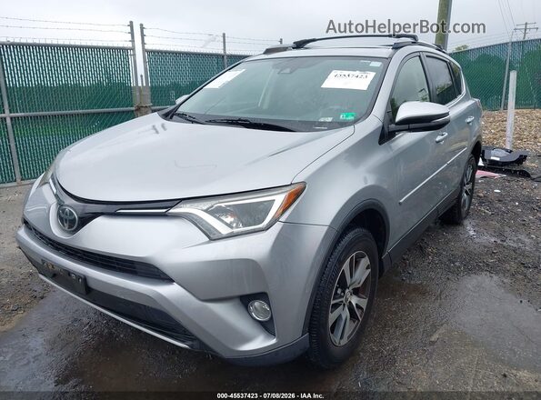 JTMRFREV2JJ235199 2018 TOYOTA RAV4 Silver Przód lewy
