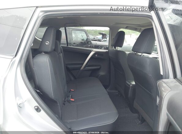 JTMRFREV2JJ235199 2018 TOYOTA RAV4 Silver Widok naklejki z numerem VIN