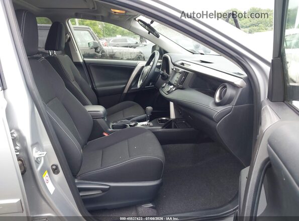 JTMRFREV2JJ235199 2018 TOYOTA RAV4 Silver Widok wnętrza z przodu