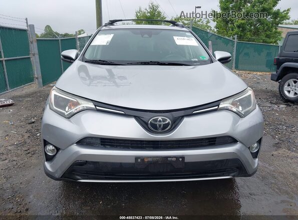 JTMRFREV2JJ235199 2018 TOYOTA RAV4 Silver Widok wnętrza z tyłu