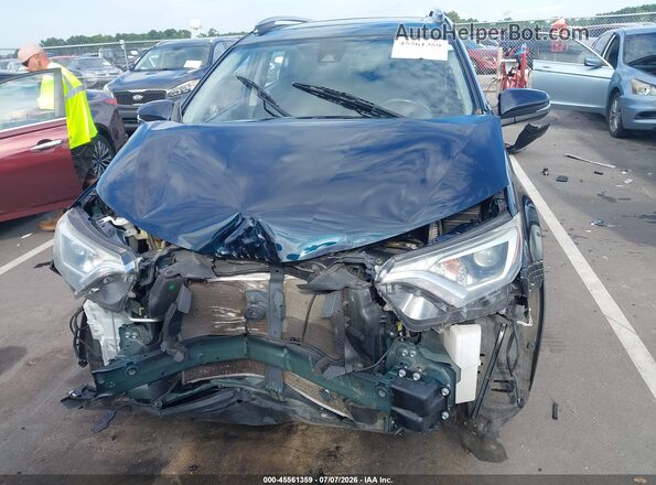 JTMRFREV2JJ247160 2018 TOYOTA RAV4 Blue Widok wnętrza z tyłu