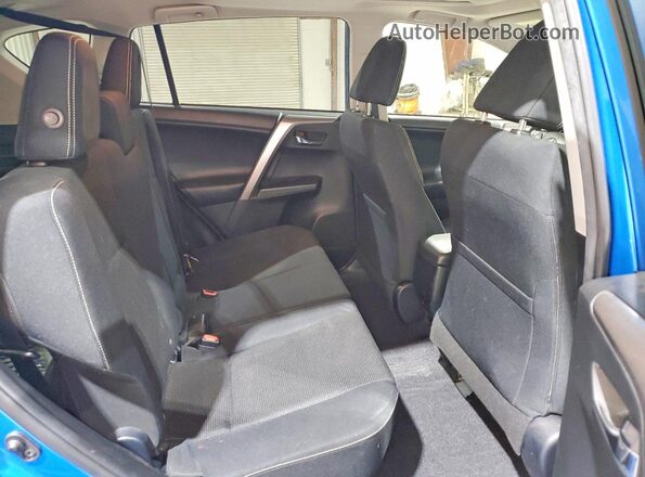 JTMRFREV2JJ720197 2018 TOYOTA RAV4 Blue Widok wnętrza z tyłu