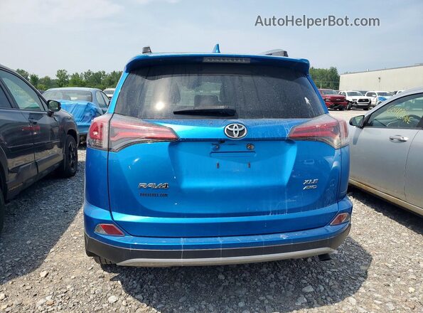JTMRFREV2JJ720197 2018 TOYOTA RAV4 Blue Widok z tyłu