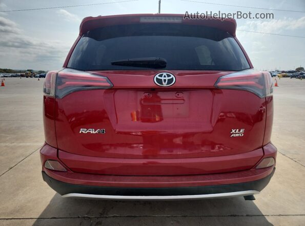JTMRFREV3HJ112330 2017 TOYOTA RAV4 Red Rear view