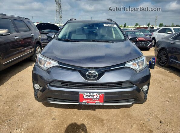JTMRFREV4GJ071012 2016 TOYOTA RAV4 Gray Widok z przodu