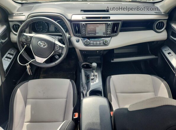 JTMRFREV4GJ071012 2016 TOYOTA RAV4 Gray Widok deski rozdzielczej