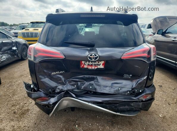 JTMRFREV4GJ071012 2016 TOYOTA RAV4 Gray Widok z tyłu