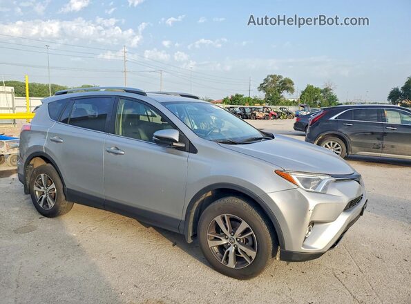 JTMRFREV4JJ204844 2018 TOYOTA RAV4 Серебряный Передняя правая четверть