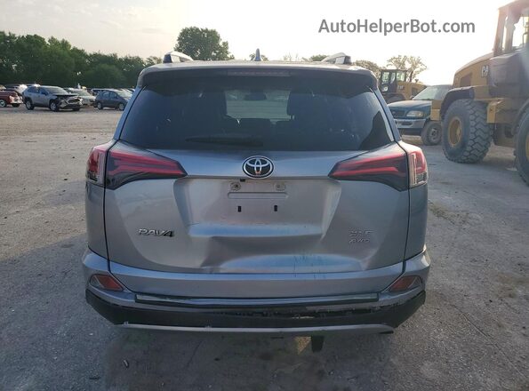 JTMRFREV4JJ204844 2018 TOYOTA RAV4 Серебряный Вид сзади