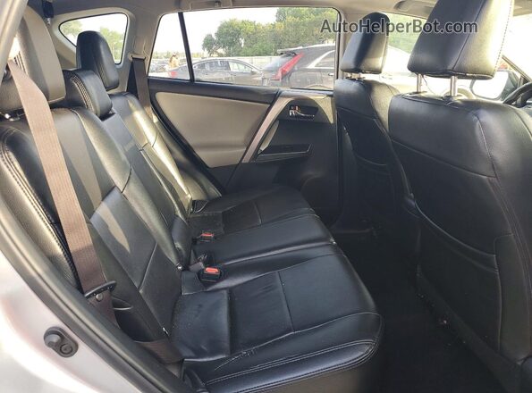 JTMRFREV4JJ204844 2018 TOYOTA RAV4 Серебряный Вид задней части салона