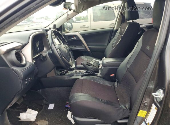 JTMRFREV4JJ246219 2018 TOYOTA RAV4 Gray Front interior view