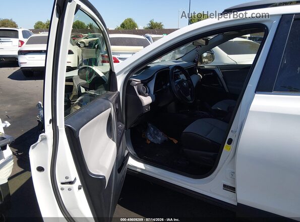 JTMRFREV6JJ220298 2018 TOYOTA RAV4 Белый Вид салона спереди