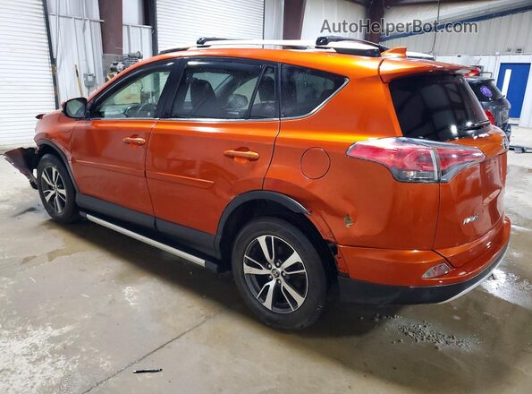 JTMRFREV7GJ080108 2016 TOYOTA RAV4 Orange Rear left