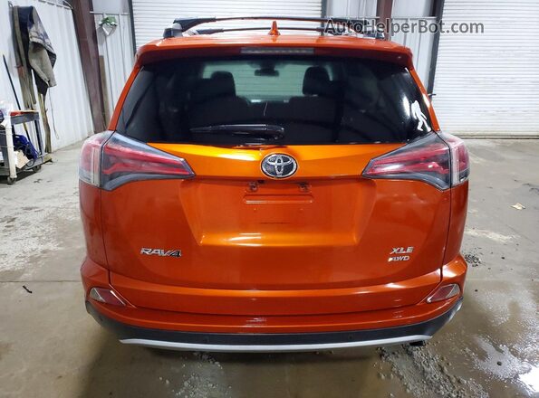 JTMRFREV7GJ080108 2016 TOYOTA RAV4 Orange Rear view