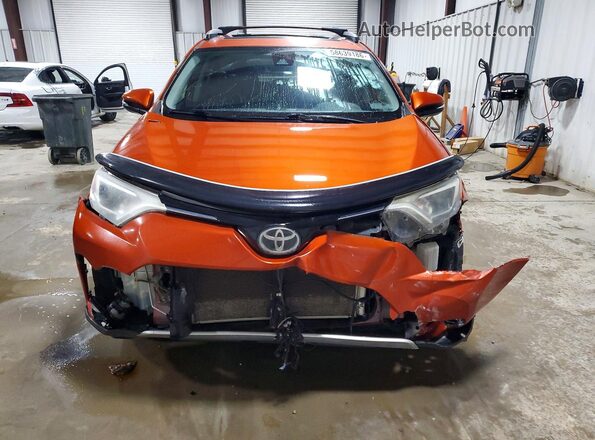 JTMRFREV7GJ080108 2016 TOYOTA RAV4 Orange Front view