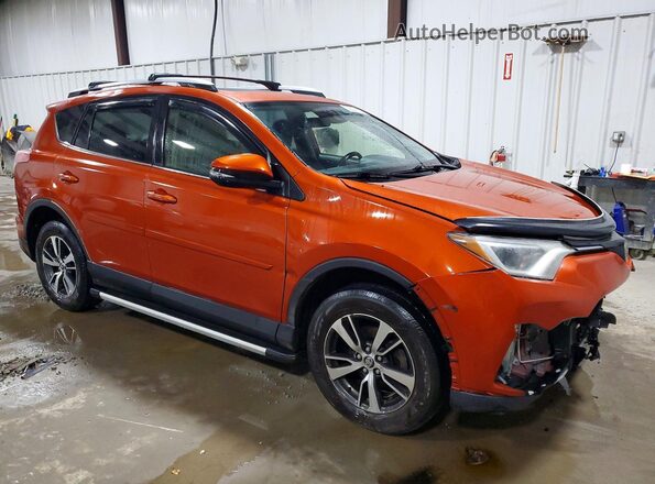 JTMRFREV7GJ080108 2016 TOYOTA RAV4 Orange Front right