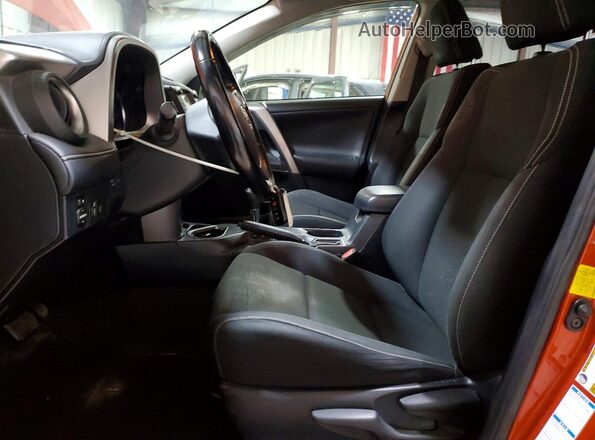JTMRFREV7GJ080108 2016 TOYOTA RAV4 Orange Front interior view