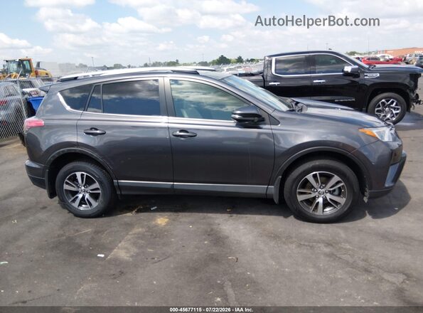 JTMRFREV7GJ102253 2016 TOYOTA RAV4 Gray Вид задньої частини салону