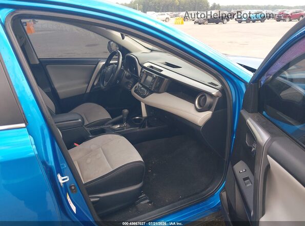 JTMRFREV7GJ103242 2016 TOYOTA RAV4 Синий Вид салона спереди
