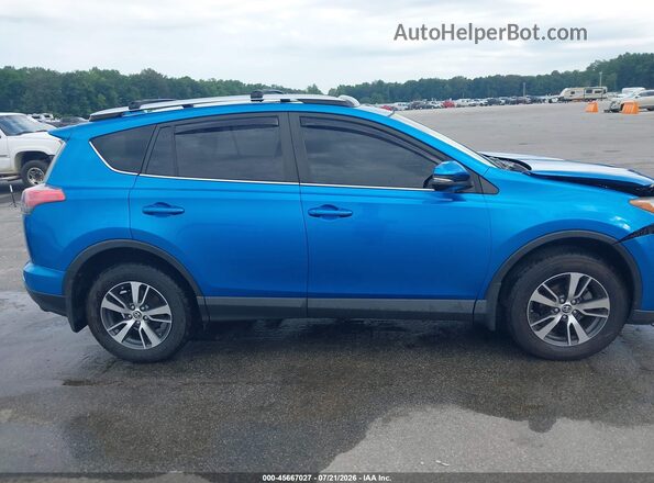 JTMRFREV7GJ103242 2016 TOYOTA RAV4 Синий Вид задней части салона