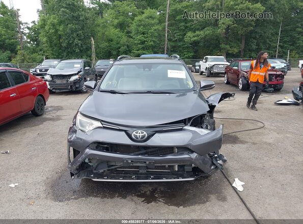 JTMRFREV7HJ701879 2017 TOYOTA RAV4 Gray წინა პანელის ხედი