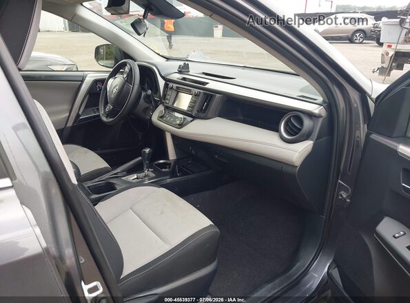 JTMRFREV7HJ701879 2017 TOYOTA RAV4 Gray წინა სალონის ხედი