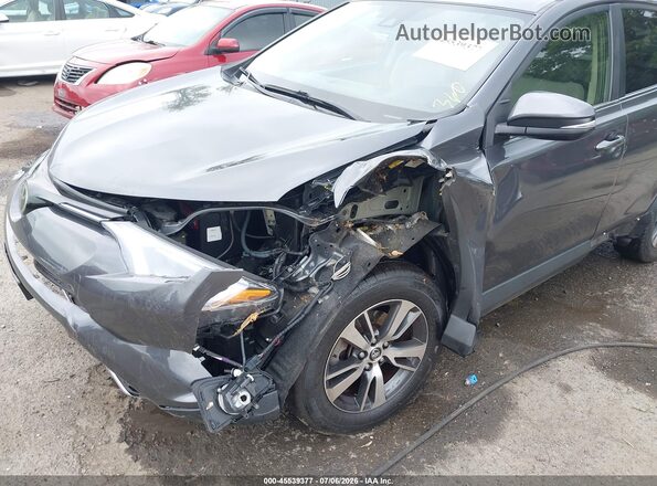 JTMRFREV7HJ701879 2017 TOYOTA RAV4 Gray წინა ხედი