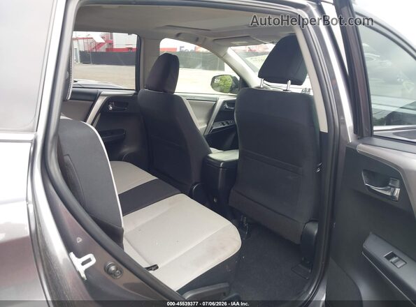 JTMRFREV7HJ701879 2017 TOYOTA RAV4 Gray VIN კოდის სტიკერის ხედი