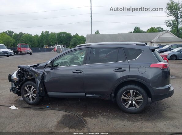 JTMRFREV7HJ701879 2017 TOYOTA RAV4 Gray უკანა სალონის ხედი