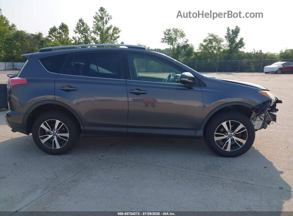 JTMRFREV7HJ711117 2017 TOYOTA RAV4 Gray Սալոնի հետևի տեսք