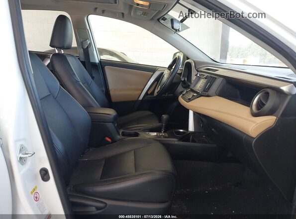 JTMRFREV8GD196660 2016 TOYOTA RAV4 White Front interior view