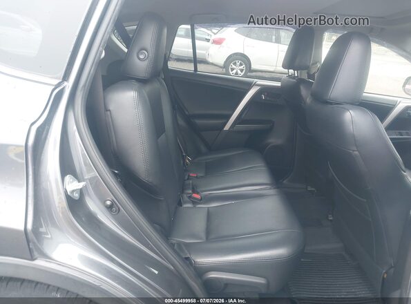 JTMRFREV8JD229776 2018 TOYOTA RAV4 Gray VIN კოდის სტიკერის ხედი