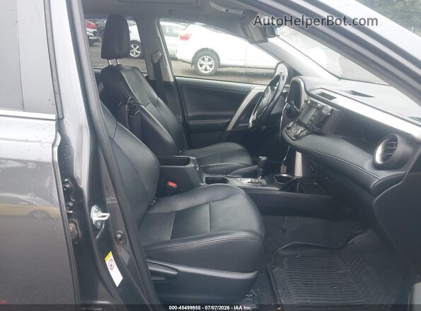 JTMRFREV8JD229776 2018 TOYOTA RAV4 Gray წინა სალონის ხედი