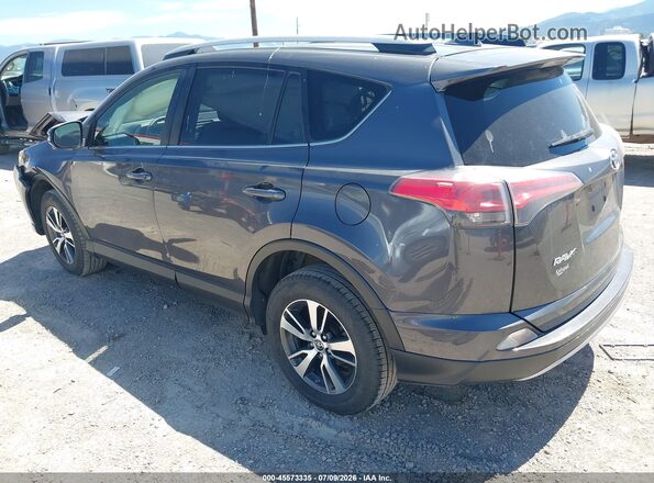 JTMRFREV8JJ728031 2018 TOYOTA RAV4 Gray Rear left