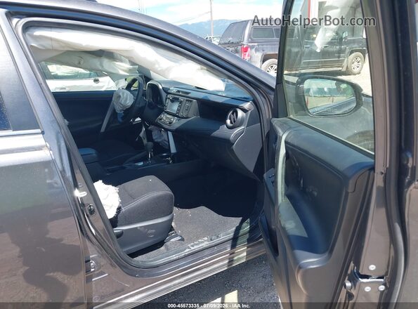 JTMRFREV8JJ728031 2018 TOYOTA RAV4 Gray Front interior view