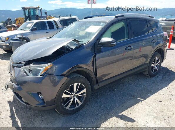JTMRFREV8JJ728031 2018 TOYOTA RAV4 Gray Front left