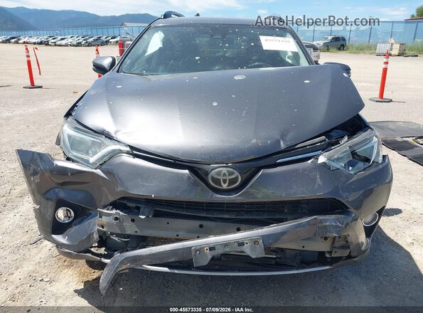 JTMRFREV8JJ728031 2018 TOYOTA RAV4 Gray Rear interior view