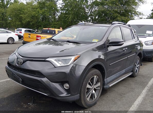 JTMRFREVXHJ702380 2017 TOYOTA RAV4 Gray Vista tres cuartos delantera izquierda