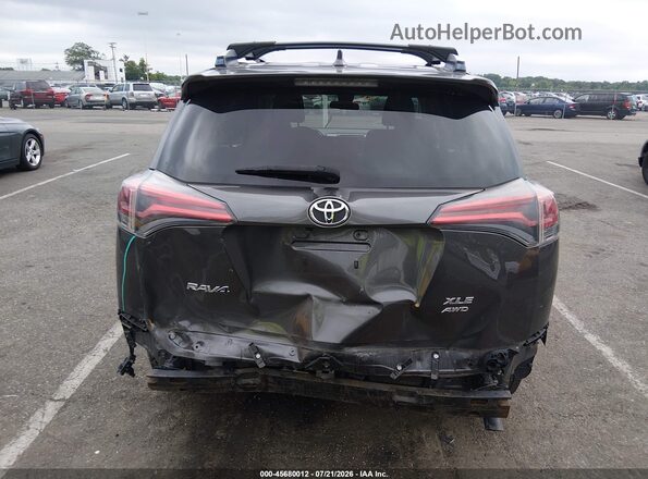 JTMRFREVXHJ702380 2017 TOYOTA RAV4 Gray Vista frontal