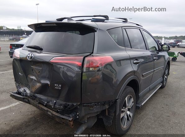 JTMRFREVXHJ702380 2017 TOYOTA RAV4 Gray Trasero derecho