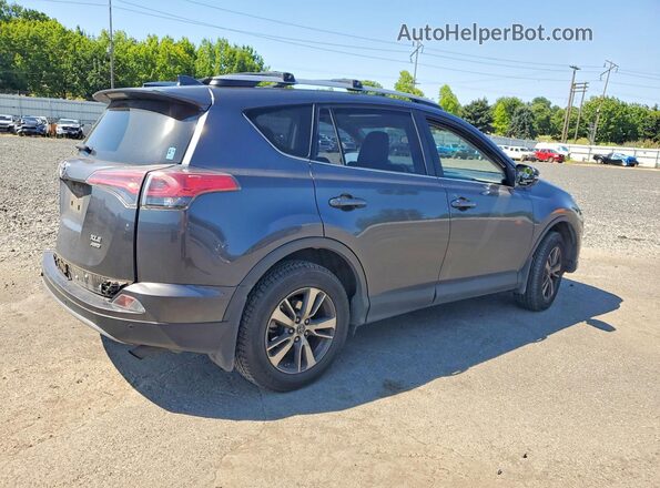 JTMRFREVXHJ713444 2017 TOYOTA RAV4 Gray Trasero derecho