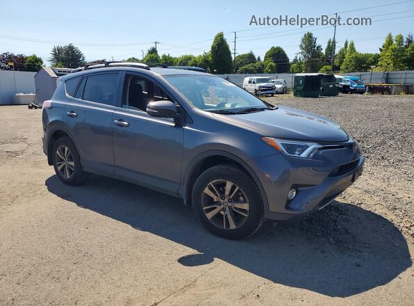 JTMRFREVXHJ713444 2017 TOYOTA RAV4 Gray Delantero derecho