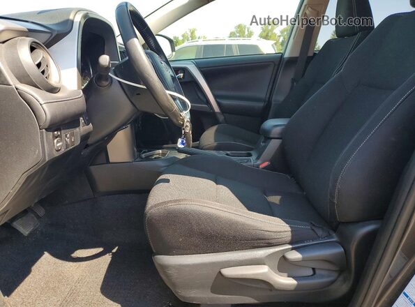 JTMRFREVXHJ713444 2017 TOYOTA RAV4 Gray Vista interior delantera