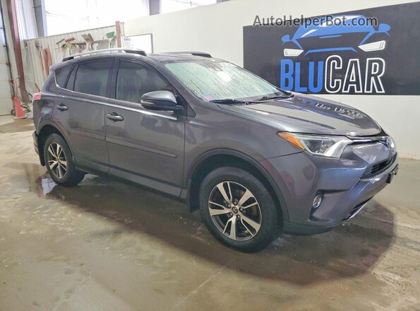 JTMRFREVXJJ241462 2018 TOYOTA RAV4 Charcoal Front right