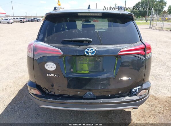 JTMRJREV0JD179146 2018 TOYOTA RAV4 HYBRID Black 