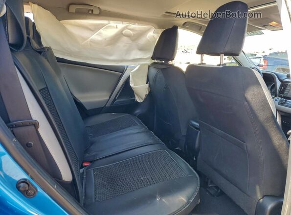 JTMRJREV1GD000153 2016 TOYOTA RAV4 Blue უკანა სალონის ხედი
