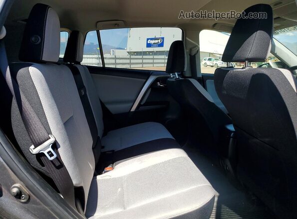 JTMRJREV1GD030544 2016 TOYOTA RAV4 Charcoal Vista interior trasera