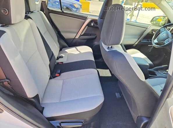 JTMRJREV1HD152872 2017 TOYOTA RAV4 White Rear interior view
